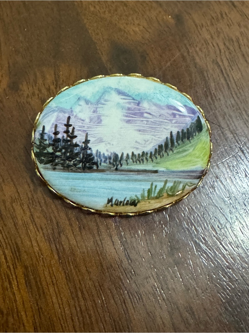 Vintage hand-painted brooch of a serene landscape scene, Signed Marlow